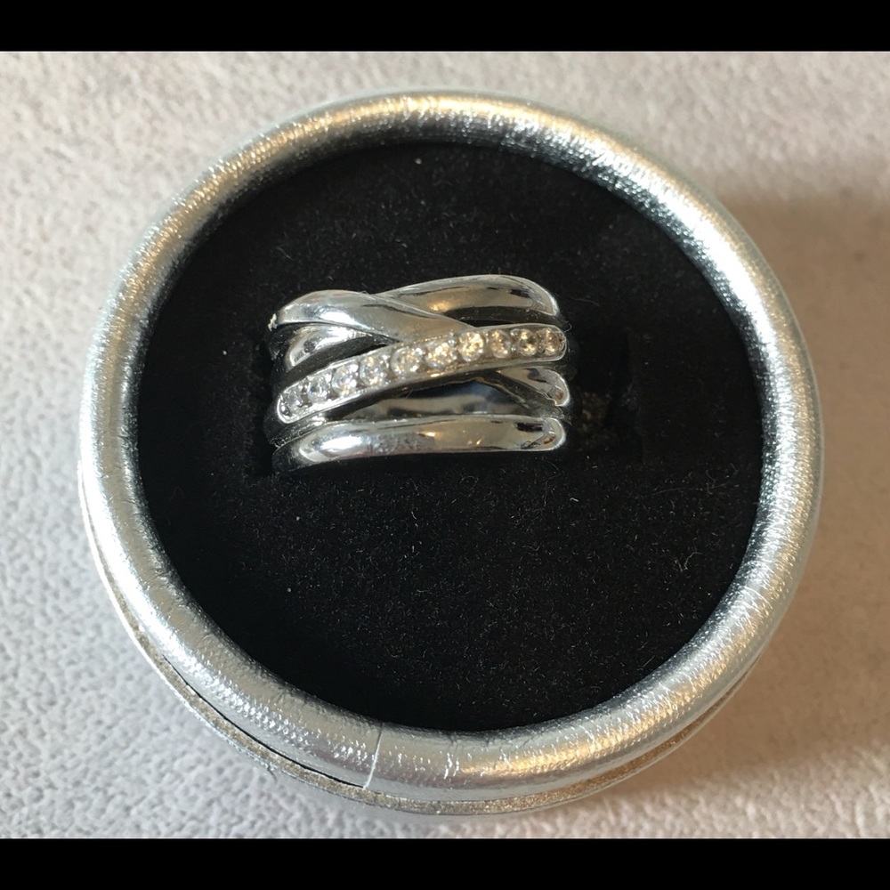 This is very well made rhodium plated stainless steel with crystals